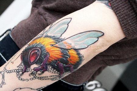 Jeff Norton - Bumble Bee piece on forearm 