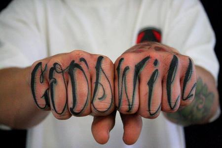 Tattoos - 'God's Will' across knuckles  - 74941