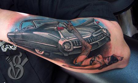 1959 Cadillac hot rod with pin up color arm tattoo