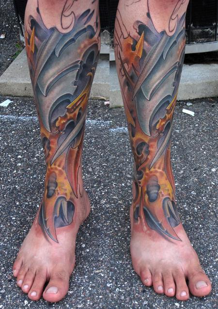 bio organic mechanical color leg tattoo
