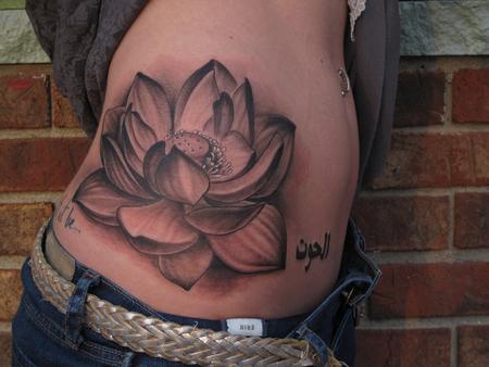 Black and grey lotus flower girl side tattoo Black and grey lotus flower girl side tattoo