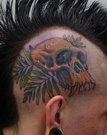 tattoos on head. chimp skull fern head tattoo