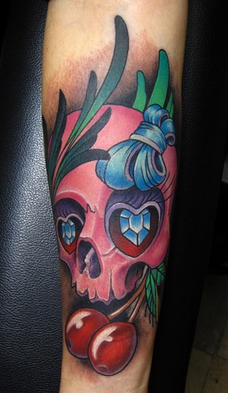 pink girl skull with cherries color arm tattoo