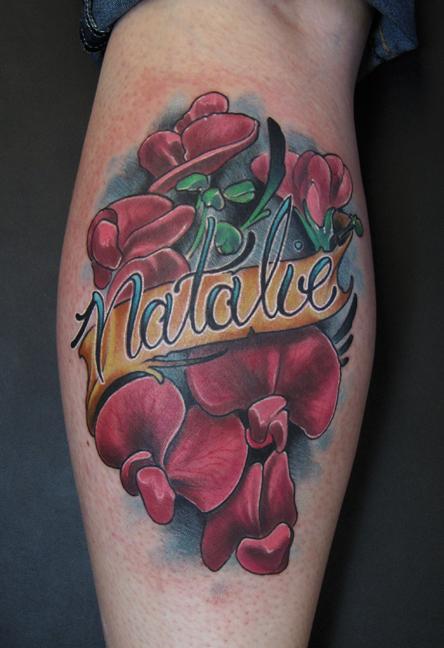 Jon von Glahn sweet pea flower color leg tattoo