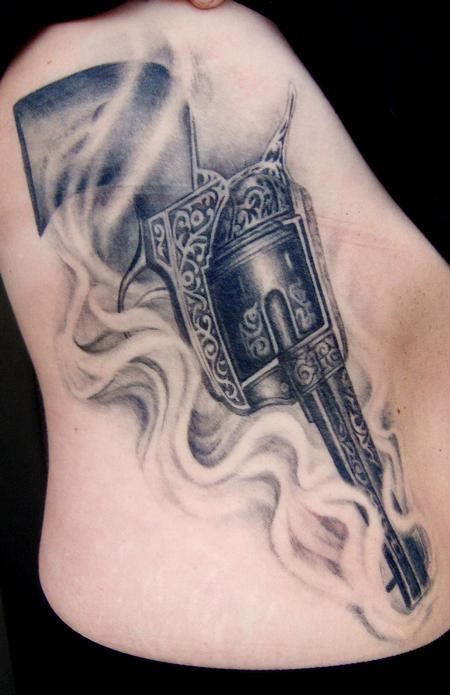 Tattoos - Revolver on ribs - 56782