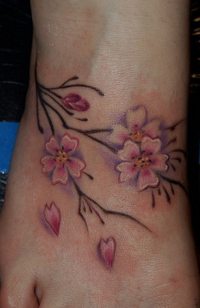 flower tattoos on foot. Cherry Blossoms foot tattoo