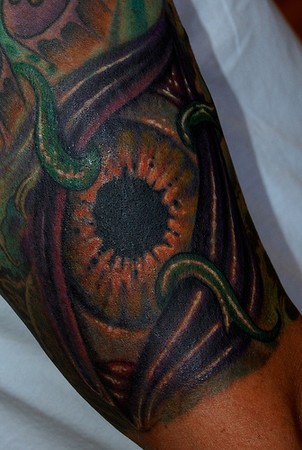 vines tattoo. Eye and vines tattoo