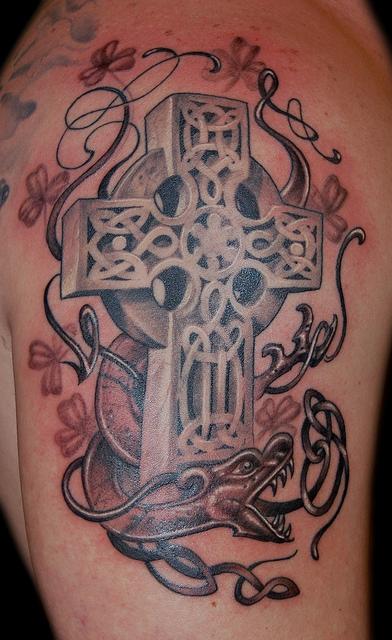 Here's a different spin on the celtic cross tattoo Lot's of fun