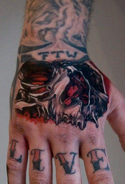 Thomas-kYnst - skull hand tattoo