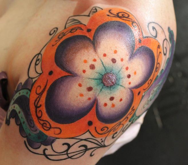 Simple flower tattoo