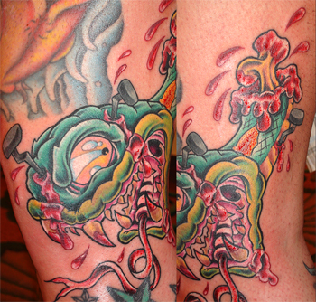 Tattoos - Movie Horror tattoos - nailed snake head