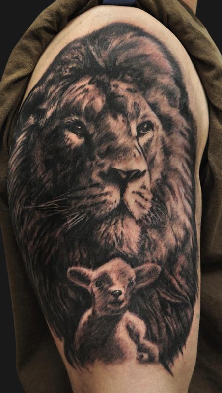 The lion of Judah the lamb of god had alot of fun with this tattoo