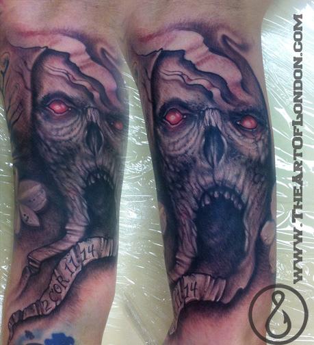This black and grey zombie skull demon tattoo is part of a gnarly dark 