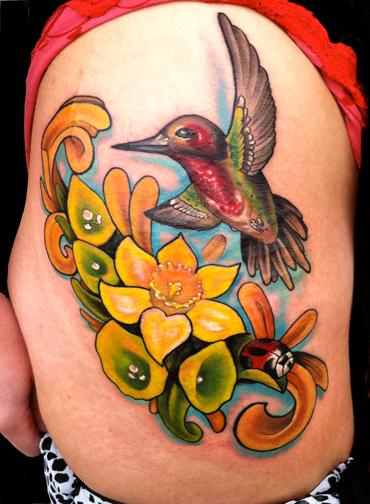Katelyn Crane - Hummingbird, bells of Ireland and Dafodil tattoo