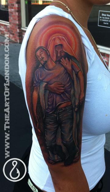 Jesus Holding Man Tattoo