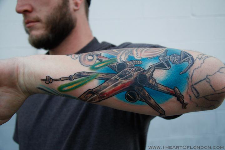 Comments Dave asked for a Star Wars X Wing Fighter filler tattoo on his arm