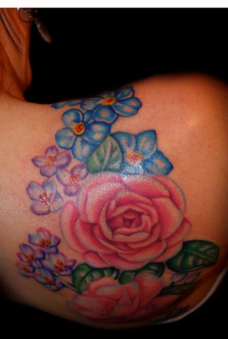 Mallory Johnstone - floral back tattoo