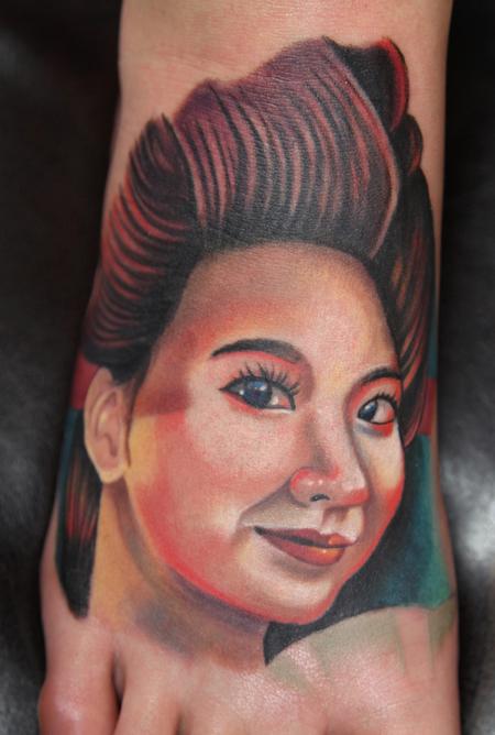 Mario Rosenau - colored realistic portrait of asian woman tattoo