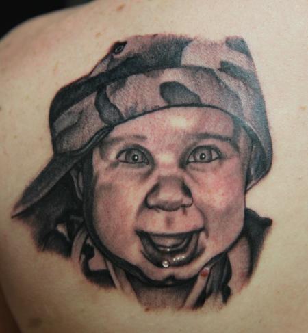 Mario Rosenau - black and gray portrait tattoo