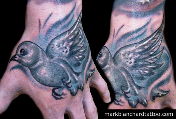 dove hand tattoo