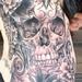 Skull and Flowers Ribs Tattoo Tattoo Thumbnail