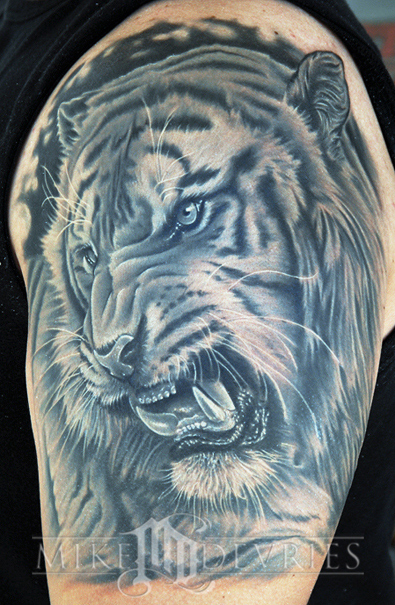 Comments All grey scale Tiger Tattoo Half sleeveDone in 07