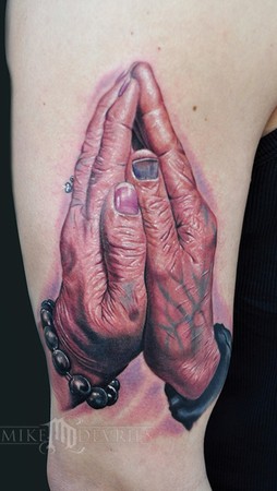 praying hands tattoo