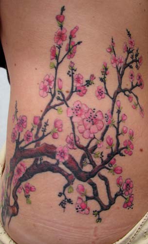 cherry blossom branch tattoo. cherry blossom branches