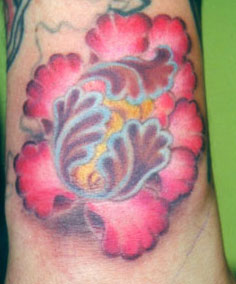 Tattoos - Kim Reed - tibetan flower