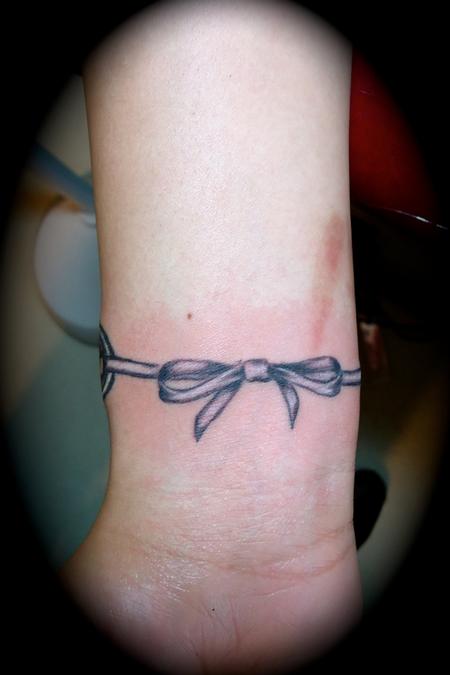 Tiny lil bow ribbon with lace bracelet cover up of old dudes name fun lil