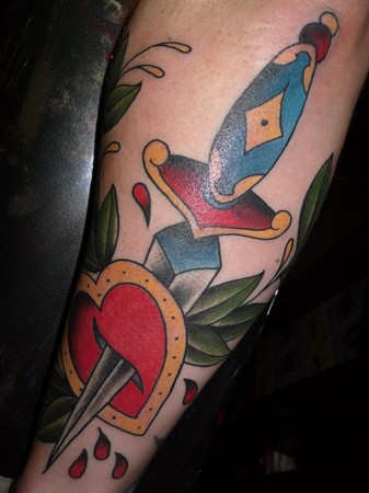 Traditional Heart And Dagger Tattoo