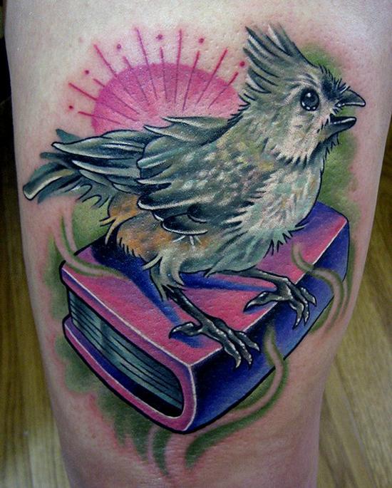 book tattoos. Bird and Book Tattoo