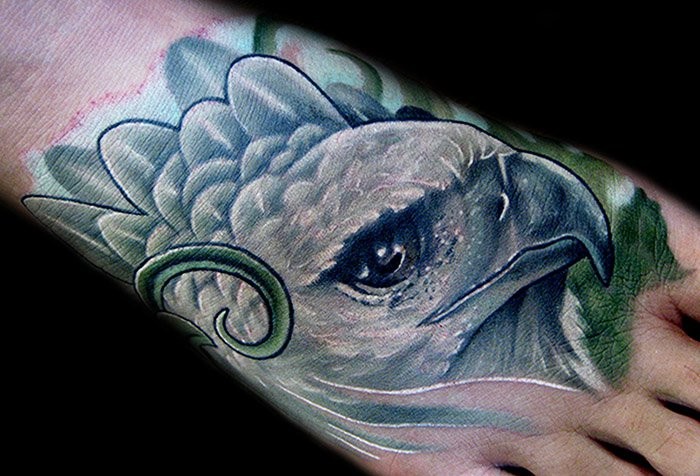 Looking for unique John Montalvo Tattoos Foot bird tattoo