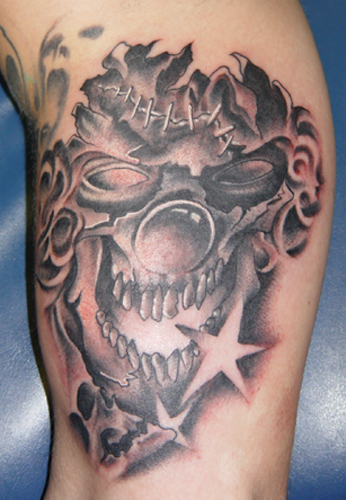 evil skull tattoo. Off the Map Tattoo