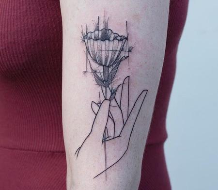 Tattoos - Hand holding flower tattoo - 128312