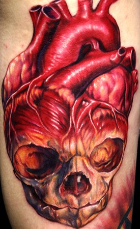 human heart tattoos. Fetus Skull Human Heart Tattoo