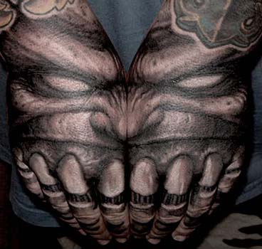 tattoos for hands. with teeth hand tattoo