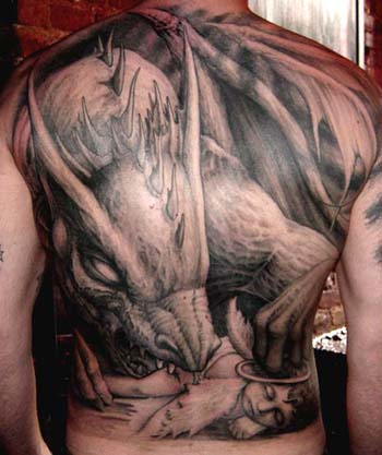 Tattoos - Dragon eating an angel tattoo - 28921