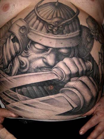 creepy evil black and gray warrior with a sword tattoo on the stomach