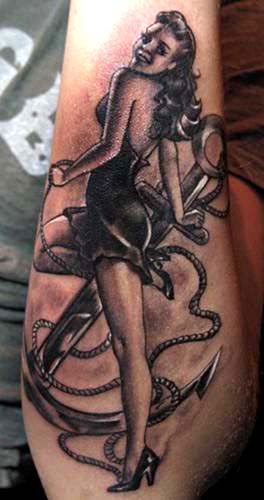custom black and gray pin up girl and anchor tattoo