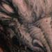 tattoo galleries/ - Dragon eating an angel tattoo - 28921