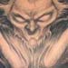 tattoo galleries/ - Bat face with horned skulll chest and stomach tattoo