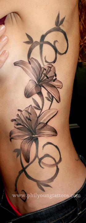 Lily tattoo on side