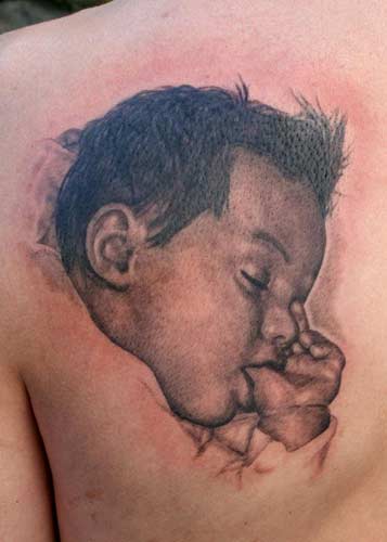 Phil Young - Sleeping baby portrait tattoo