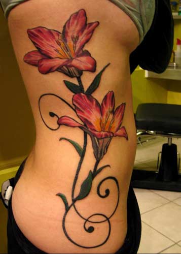 spanish tattoos. tiger lilies tattoo