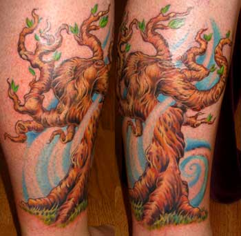 Looking for unique  Tattoos? tree in the wind tattoo