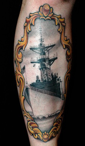 Tattoos Russ Abbott Battleship tattoo in a Victorian frame