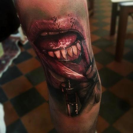 Sam Barber - Needle-Lip Color Tattoo