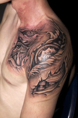 ripped skin tattoo. Torn skin with bio-mechanic