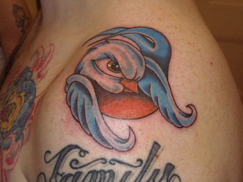 Mark Manley - Cartoon sparrow on top of shoulder